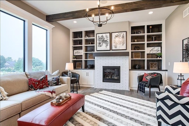 3409 W 187th St, Overland Park, KS 66085 - living area featuring beam ceiling, wood finished floors, a fireplace, recessed lighting, and built in features