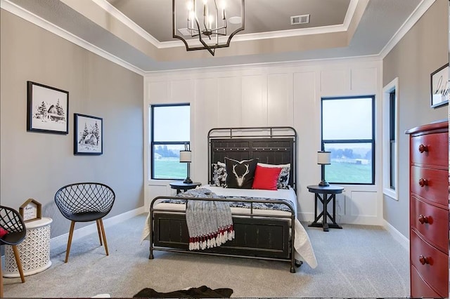 3409 W 187th St, Overland Park, KS 66085 - bedroom with carpet floors, a chandelier, multiple windows, ornamental molding, and a tray ceiling