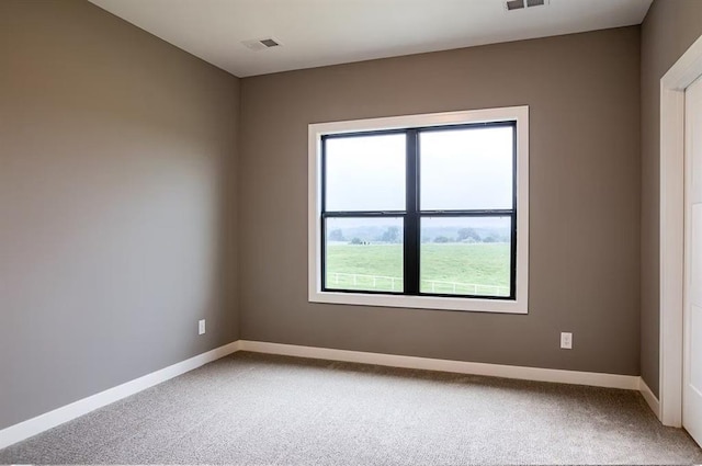 3409 W 187th St, Overland Park, KS 66085 - spare room featuring carpet floors and baseboards