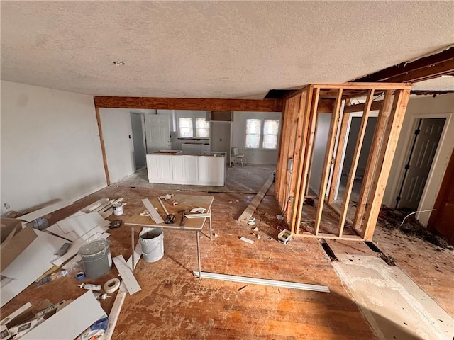 3649 S Park Ave, Independence, MO 64052 - misc room featuring a textured ceiling