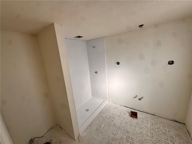3649 S Park Ave, Independence, MO 64052 - bathroom with a textured ceiling