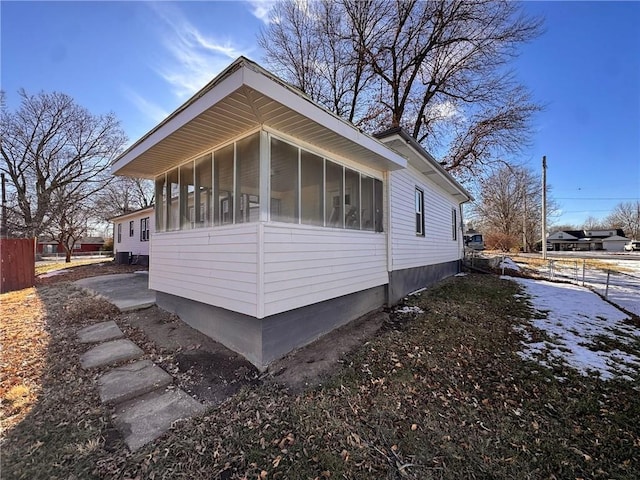 3649 S Park Ave, Independence, MO 64052 - view of home's exterior featuring a sunroom