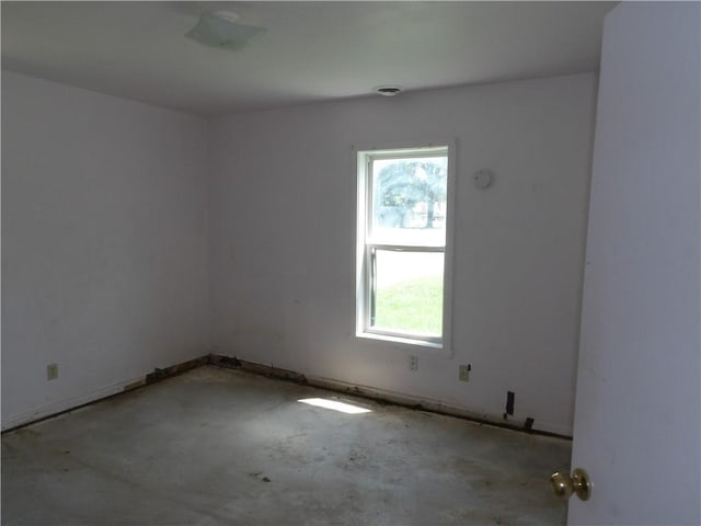 604 S Lexington St, Holden, MO 64040 - spare room with concrete floors
