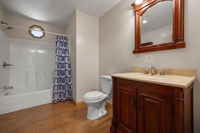 295 E 2300th Rd, Edgerton, KS 66021 - full bath featuring wood finished floors, vanity, and shower / tub combo with curtain