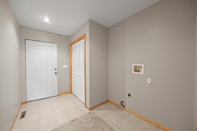 295 E 2300th Rd, Edgerton, KS 66021 - washroom featuring electric dryer hookup, washer hookup, light tile patterned floors, and recessed lighting