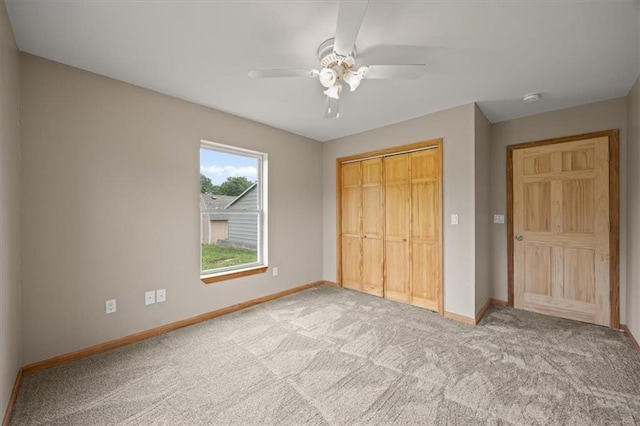 295 E 2300th Rd, Edgerton, KS 66021 - unfurnished bedroom featuring carpet flooring, a closet, and ceiling fan