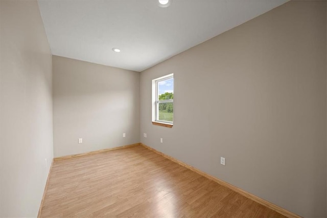 295 E 2300th Rd, Edgerton, KS 66021 - unfurnished room with wood finished floors and recessed lighting
