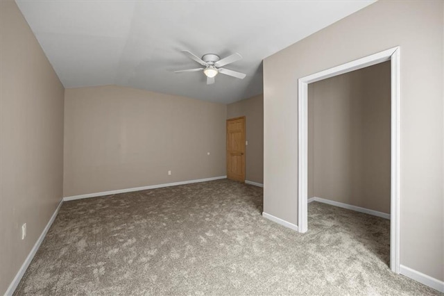 295 E 2300th Rd, Edgerton, KS 66021 - unfurnished bedroom with carpet, vaulted ceiling, and a ceiling fan