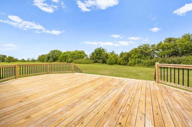 295 E 2300th Rd, Edgerton, KS 66021 - wooden deck featuring a lawn and view of wooded area