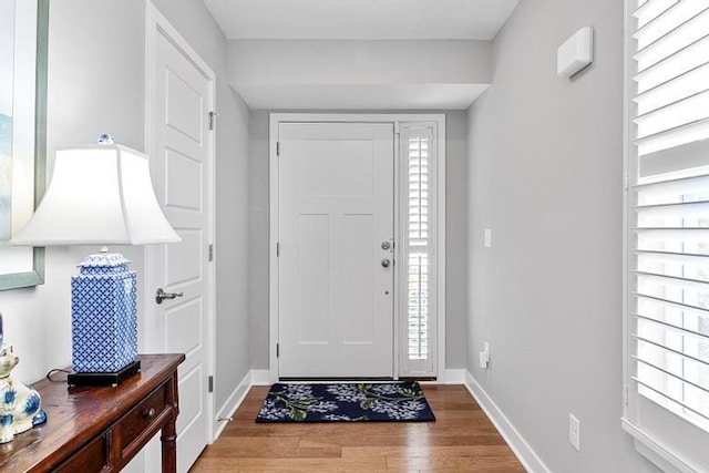 3726 SW Walsh Dr, Lees Summit, MO 64082 - entryway featuring wood finished floors and baseboards