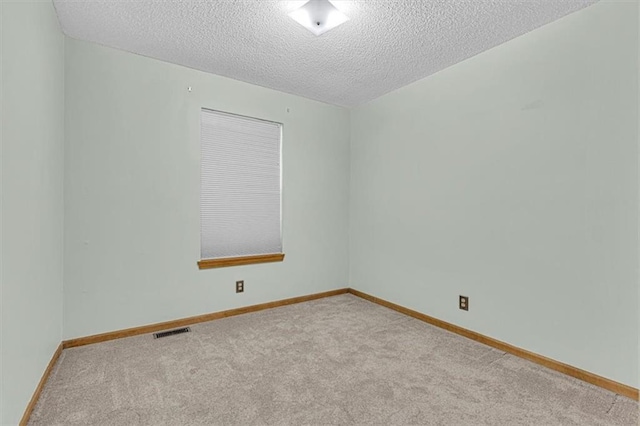 21213 W 51st Ter, Shawnee, KS 66218 - unfurnished room with carpet floors and a textured ceiling
