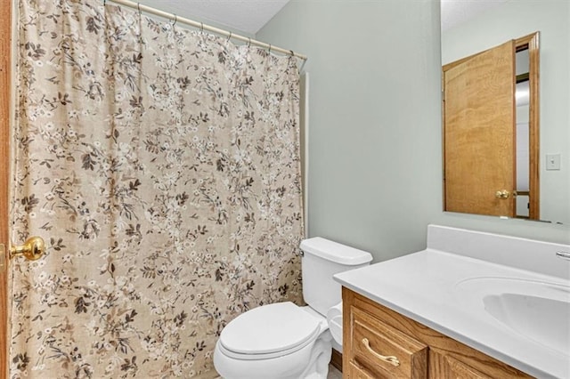 21213 W 51st Ter, Shawnee, KS 66218 - full bathroom featuring vanity, a textured ceiling, and a shower with shower curtain