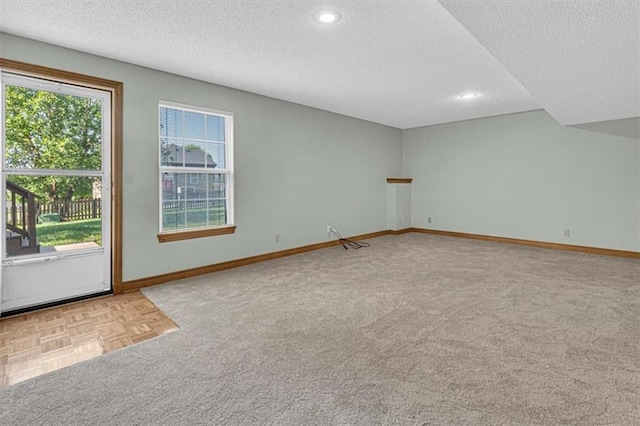 21213 W 51st Ter, Shawnee, KS 66218 - additional living space with a textured ceiling, carpet, and recessed lighting