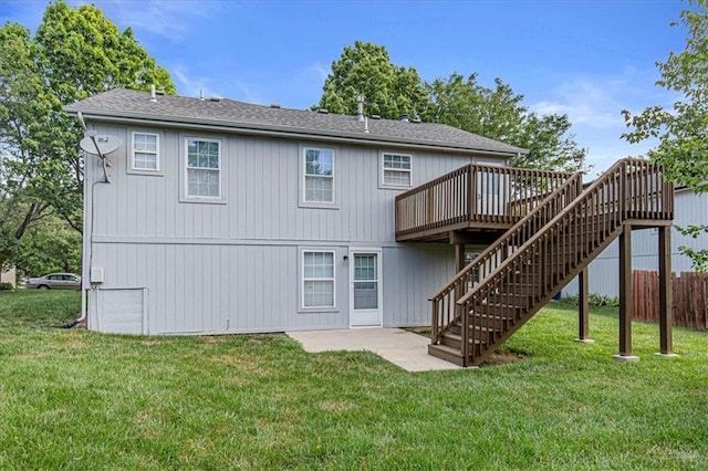 21213 W 51st Ter, Shawnee, KS 66218 - back of property featuring a deck, stairway, and roof with shingles