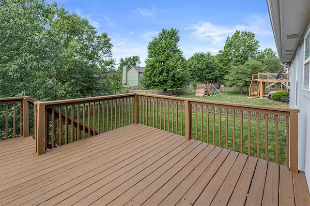 21213 W 51st Ter, Shawnee, KS 66218 - wooden terrace with a playground and a fenced backyard