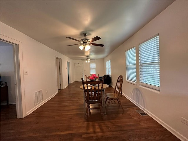 3009 N 33rd St, Kansas City, KS 66104 - dining area with ceiling fan and dark wood-type flooring