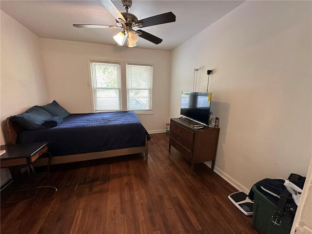 3009 N 33rd St, Kansas City, KS 66104 - bedroom featuring dark wood-type flooring and a ceiling fan