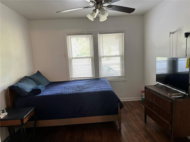 3009 N 33rd St, Kansas City, KS 66104 - bedroom featuring dark wood finished floors and ceiling fan