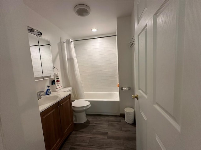3009 N 33rd St, Kansas City, KS 66104 - full bathroom with vanity, shower / bath combo, and recessed lighting