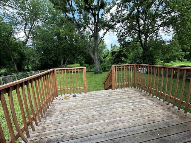 3009 N 33rd St, Kansas City, KS 66104 - wooden terrace featuring a lawn and view of scattered trees