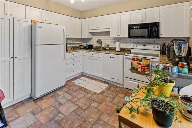 27 W Bannister Rd, Kansas City, MO 64114 - kitchen with white appliances, decorative backsplash, and white cabinets