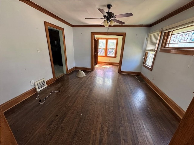 5647 Wayne Ave, Kansas City, MO 64110 - empty room featuring wood finished floors, ceiling fan, and crown molding