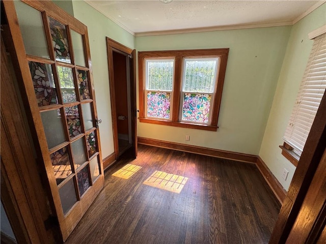 5647 Wayne Ave, Kansas City, MO 64110 - empty room with crown molding and wood finished floors