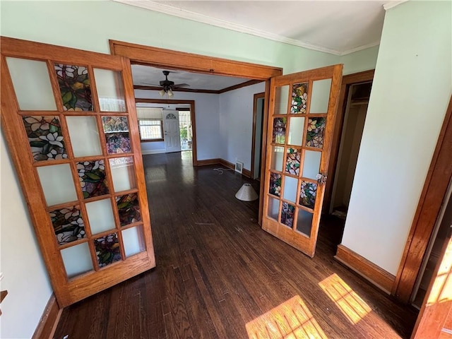5647 Wayne Ave, Kansas City, MO 64110 - corridor featuring dark wood finished floors and ornamental molding