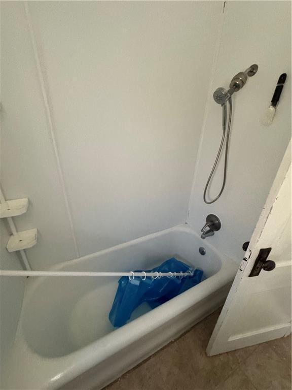 5647 Wayne Ave, Kansas City, MO 64110 - bathroom with shower / tub combination