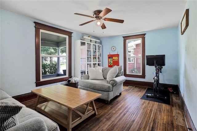 519 S Lincoln Ave, Chanute, KS 66720 - living room featuring wood finished floors and ceiling fan