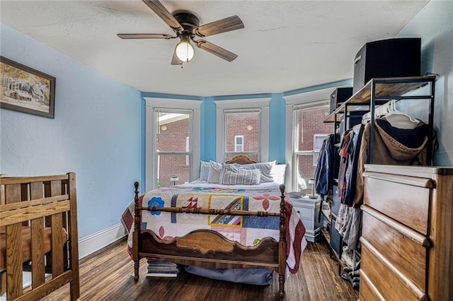 519 S Lincoln Ave, Chanute, KS 66720 - bedroom featuring wood finished floors and a ceiling fan