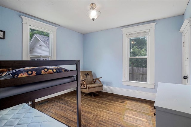 519 S Lincoln Ave, Chanute, KS 66720 - bedroom with wood finished floors and baseboards