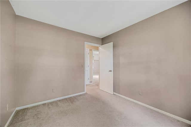 561 SW County Road O, Holden, MO 64040 - spare room featuring light colored carpet and baseboards