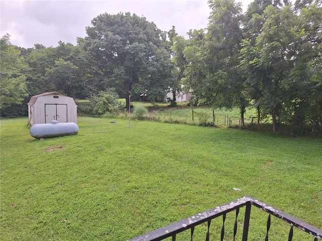 561 SW County Road O, Holden, MO 64040 - view of yard featuring a storage unit