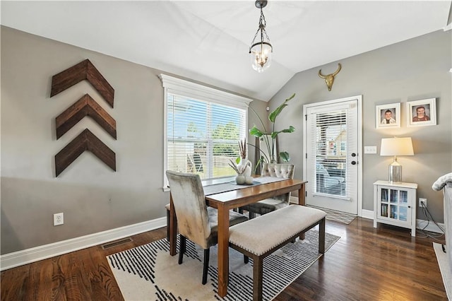 16728 Ruby Way, Basehor, KS 66007 - dining space with vaulted ceiling, a chandelier, and wood finished floors