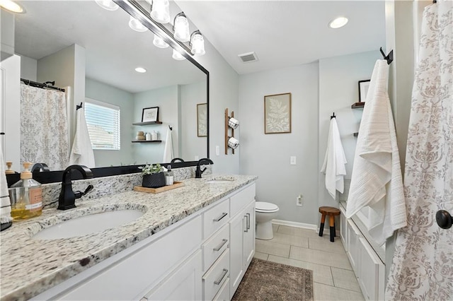 16728 Ruby Way, Basehor, KS 66007 - bathroom with double vanity, tile patterned floors, recessed lighting, and a shower with shower curtain