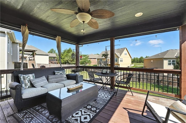16728 Ruby Way, Basehor, KS 66007 - wooden terrace with a residential view, an outdoor hangout area, and a ceiling fan