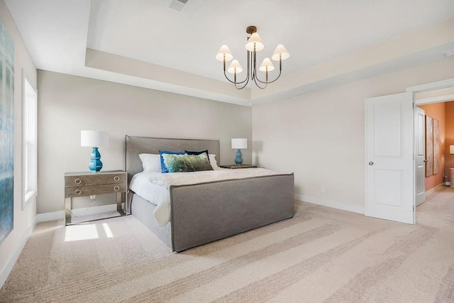 2416 W 177th St, Overland Park, KS 66085 - carpeted bedroom with a chandelier and a tray ceiling