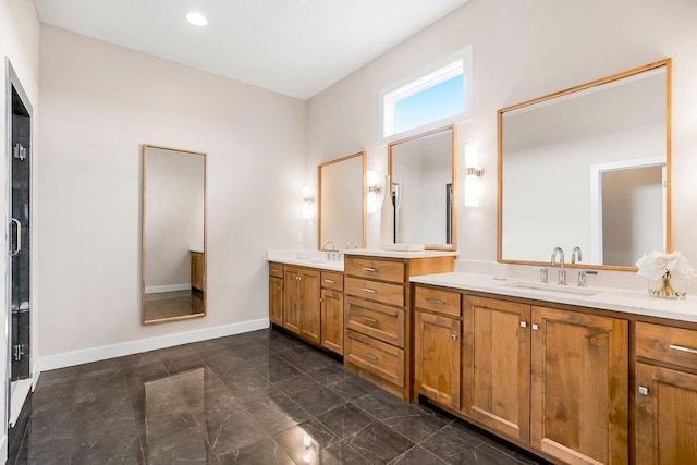 2416 W 177th St, Overland Park, KS 66085 - bathroom with double vanity and baseboards