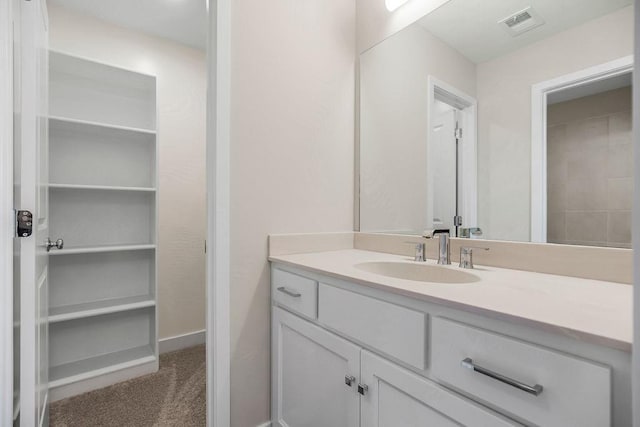 2416 W 177th St, Overland Park, KS 66085 - bathroom featuring vanity and a spacious closet