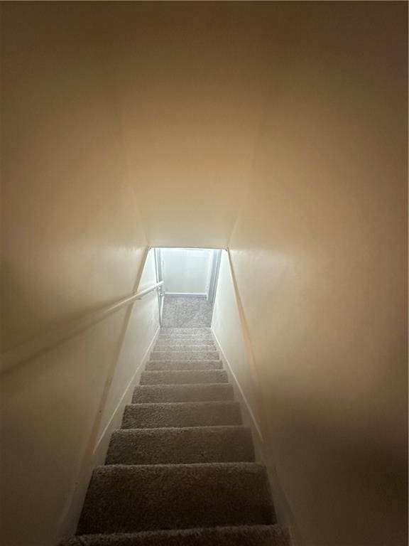 2209 E 72nd St, Kansas City, MO 64132 - stairs with carpet
