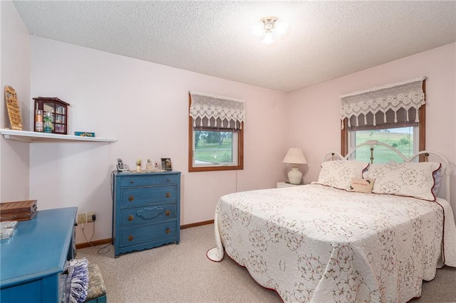 596 E 1732nd Rd, Baldwin City, KS 66006 - bedroom with carpet flooring and a textured ceiling