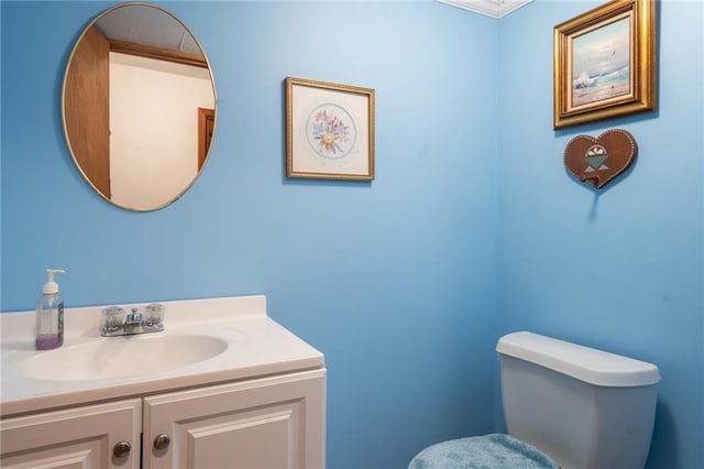 596 E 1732nd Rd, Baldwin City, KS 66006 - half bathroom featuring toilet and vanity