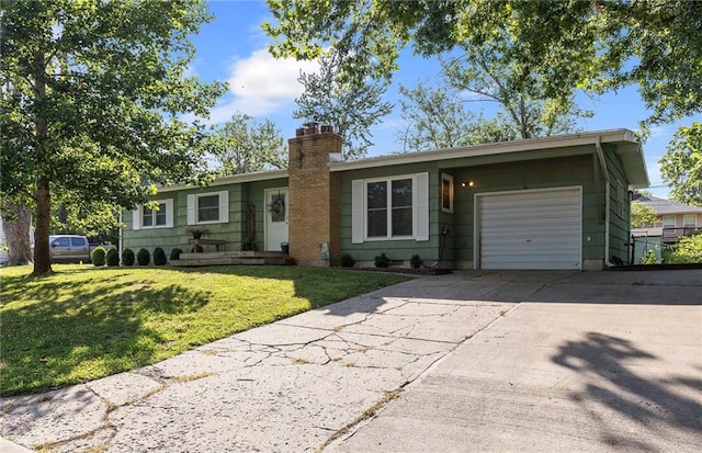1101 Anderson St, Warrensburg, MO 64093 - single story home with an attached garage, a chimney, driveway, and a front yard
