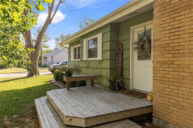 1101 Anderson St, Warrensburg, MO 64093 - wooden deck featuring a yard
