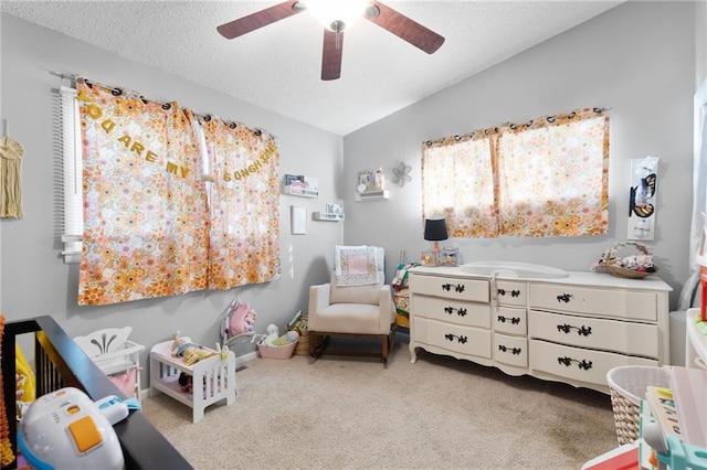 1101 Anderson St, Warrensburg, MO 64093 - playroom with carpet, a ceiling fan, and a textured ceiling