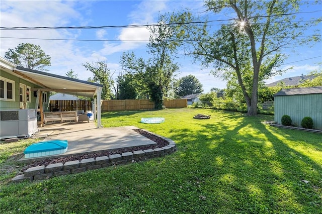 1101 Anderson St, Warrensburg, MO 64093 - fenced backyard with a patio