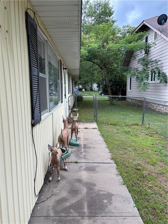 420 S Walnut St, Iola, KS 66749 - view of patio with a gate