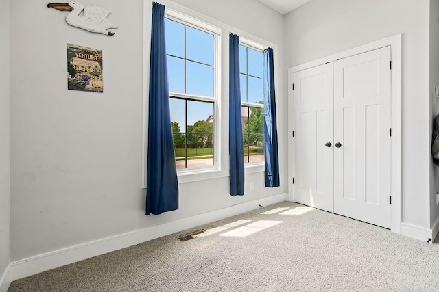 1034 SW Cheshire Dr, Lees Summit, MO 64083 - unfurnished bedroom featuring carpet and a closet