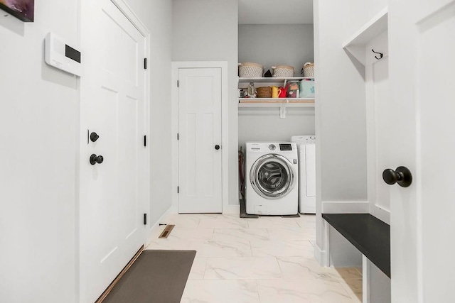 1034 SW Cheshire Dr, Lees Summit, MO 64083 - laundry room featuring light marble finish floors and independent washer and dryer